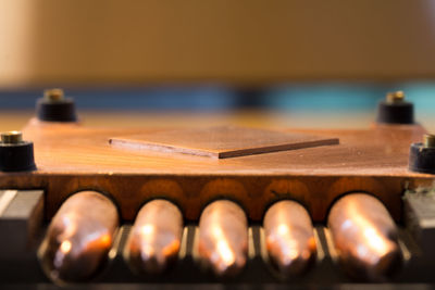 Close-up of piano on table