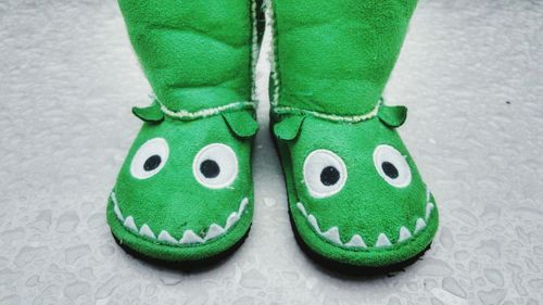 Close-up of green shoes