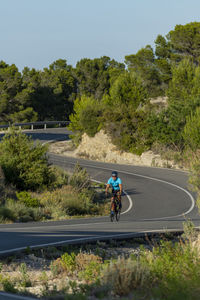 Man riding a bicycle on a costa blanca mountain road