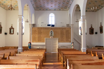 Empty chairs and tables in temple