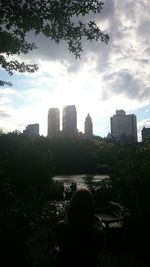 Buildings in city against sky