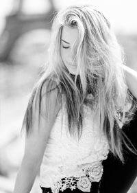 Portrait of young woman with eyes closed