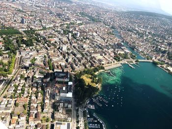 High angle view of city by river