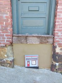 Mailbox on brick wall