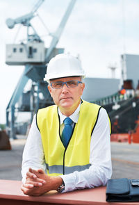 Male engineer standing at construction site