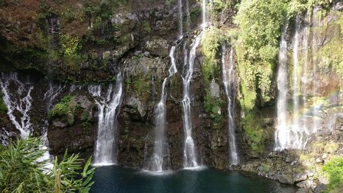 Scenic view of waterfall and waterhole