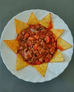 High angle view of serving food in plate on table