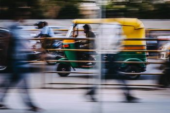 BLURRED MOTION OF TRAIN ON ROAD