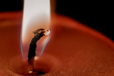 Close-up of cigarette on table