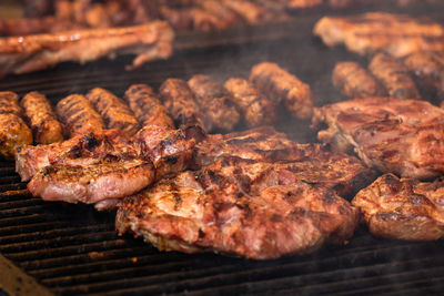 Close-up of meat on barbecue grill