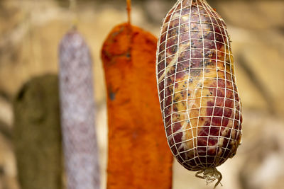 Close-up of bell hanging at market stall