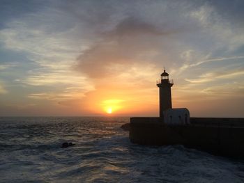 Scenic view of sea at sunset