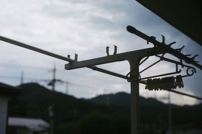 Close-up of built structure against sky