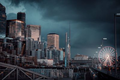 Modern buildings in city with moody sky