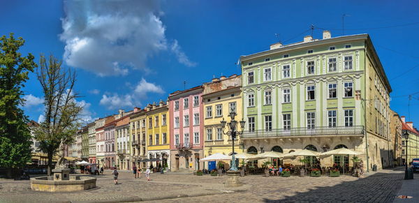 Market or rynok square in the old town of lviv, ukraine, on a sunny summer day