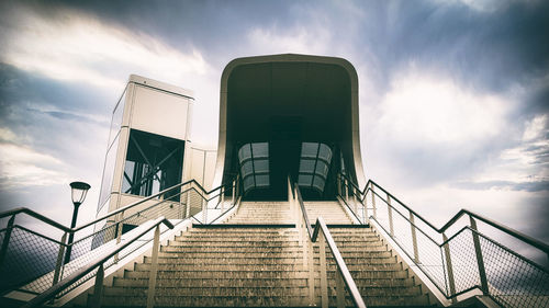 Low angle view of staircase against sky