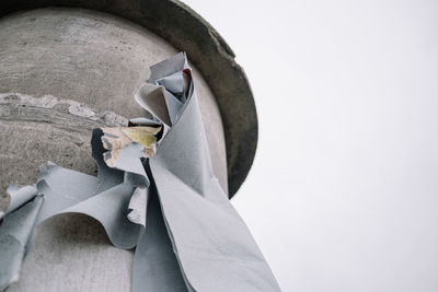 Low angle view of umbrella against white background