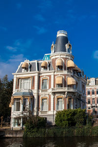 Canals and the beautiful architecture of the old central district in amsterdam