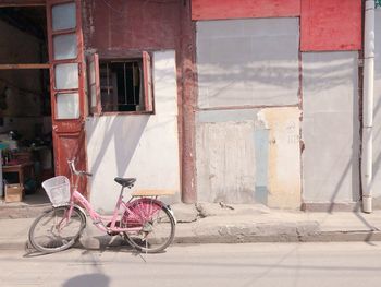 Bicycle against old building