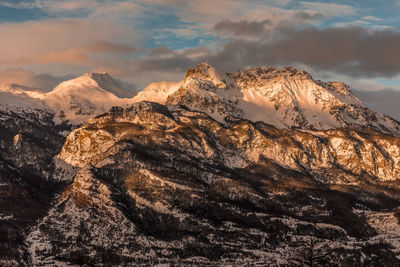 Scenic view of snowcapped mountains against sky