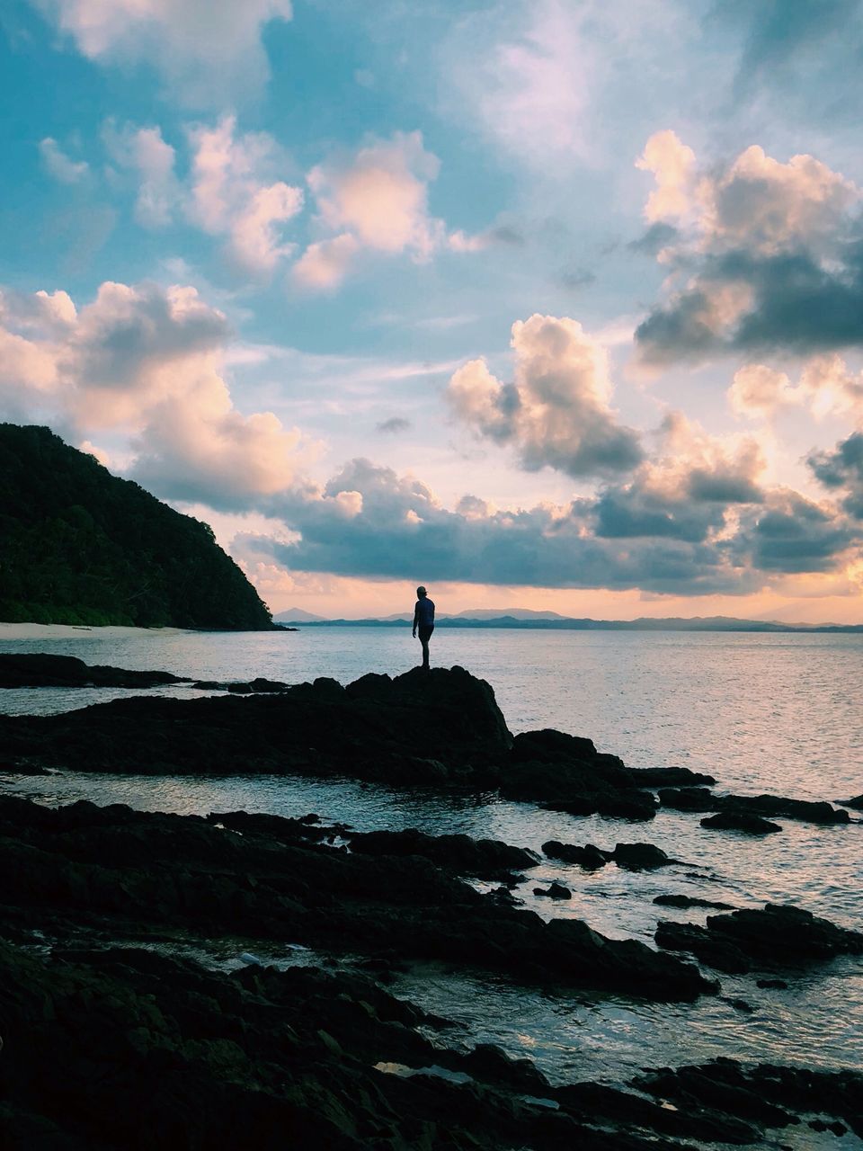 SCENIC VIEW OF BEACH DURING SUNSET