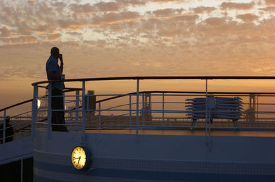 Silhouette of people at sunset