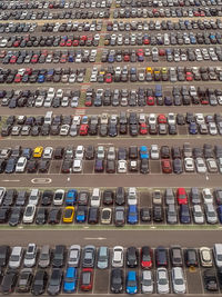 Full frame shot of multi colored pencils in row