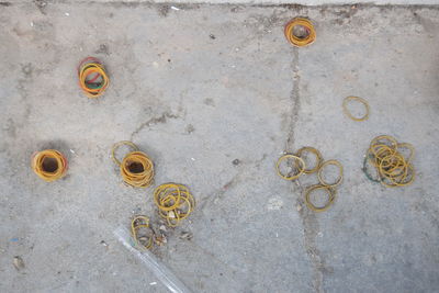 High angle view of rusty metal on wall