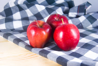 Close-up of apples on table