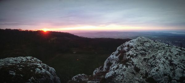 Scenic view of mountains against sky during sunset