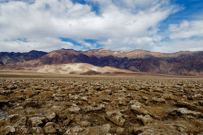 Scenic view of landscape and mountains against sky