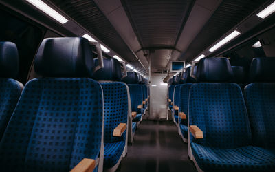 Interior of train with blue seats