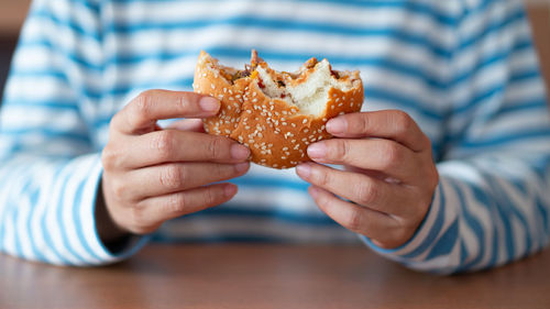 Close-up of man holding ice cream