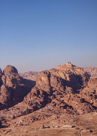 Scenic view of rocky mountains against clear sky