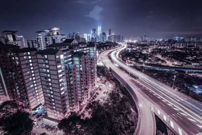 High angle view of illuminated city at night