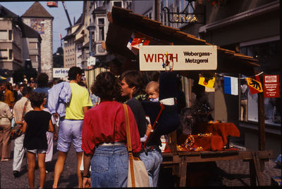 People on street in city