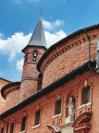 Low angle view of historic building against sky