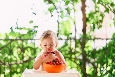 Portrait of woman eating food