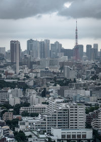 Modern buildings in city against sky