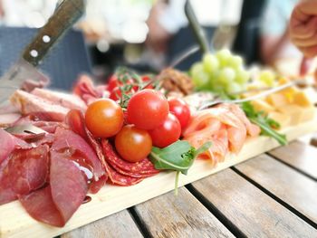 Close-up of meat and vegetables served on table