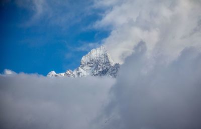 Low angle view of snow against sky