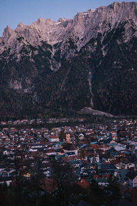 High angle view of townscape and mountains