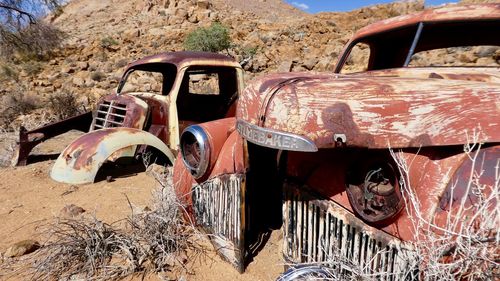 Abandoned truck on field