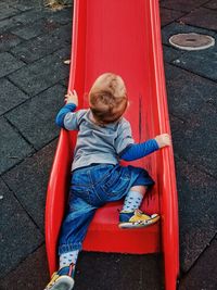 Baby crawling on slide