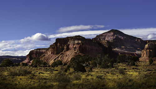 Scenic view of rocky mountains against sky