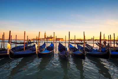 Boats moored in sea