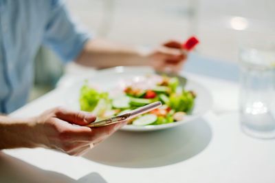 Midsection of man preparing food