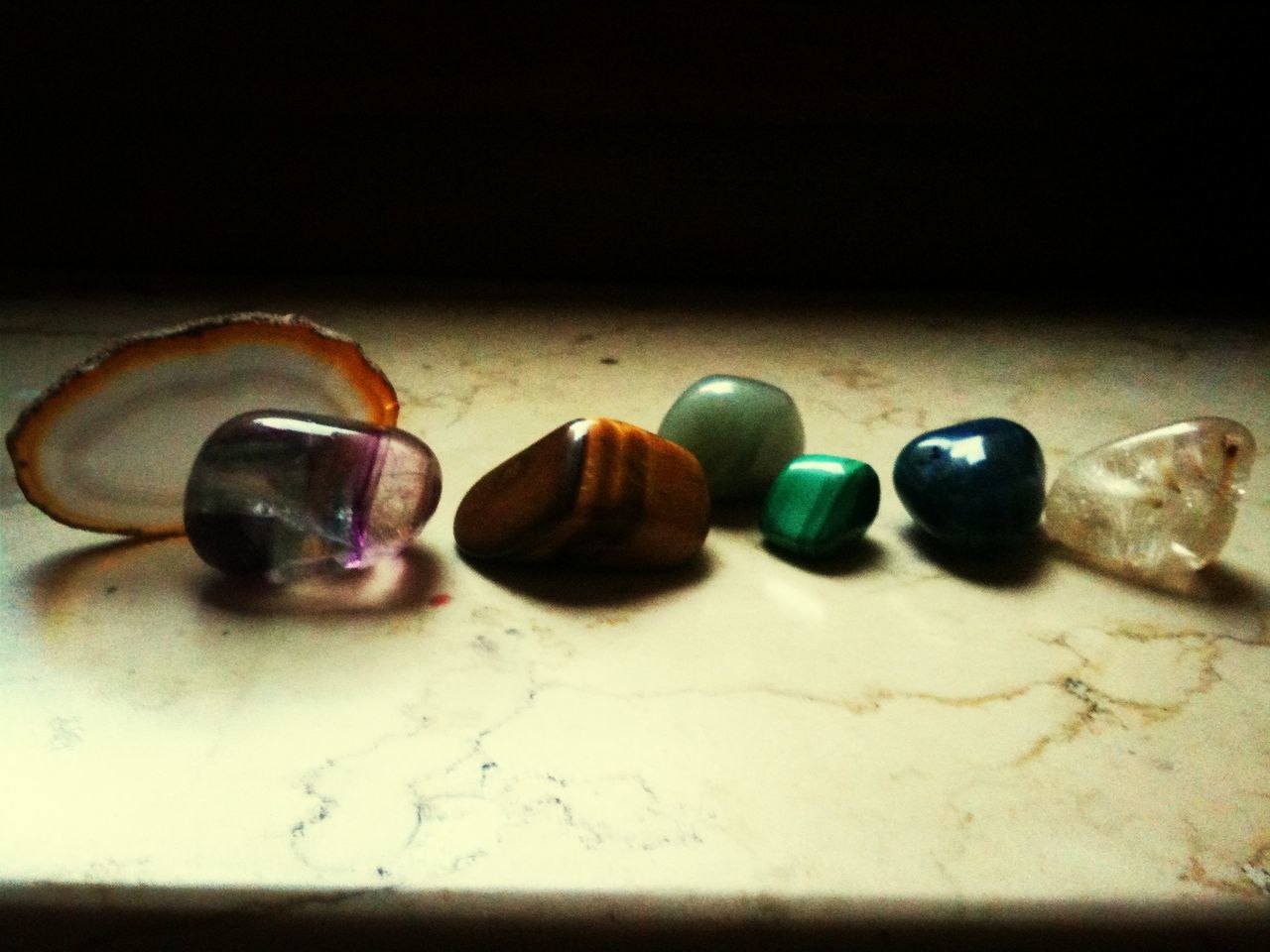 still life, indoors, variation, multi colored, table, close-up, studio shot, high angle view, medium group of objects, large group of objects, arrangement, two objects, jewelry, selective focus, choice, no people, man made object, toy, art and craft, single object