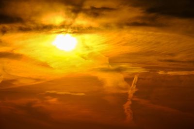 Low angle view of dramatic sky during sunset