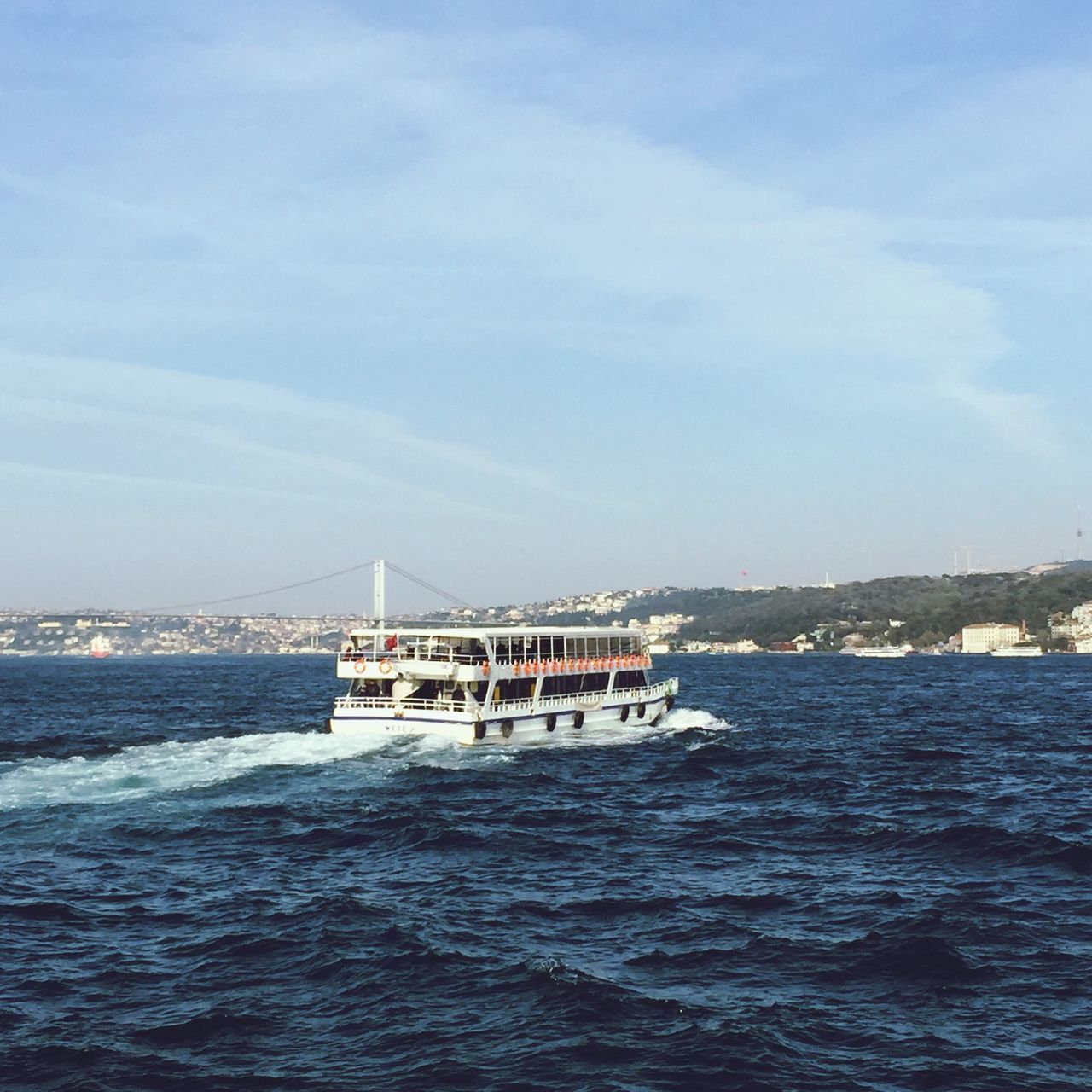 water, sea, waterfront, transportation, nautical vessel, sky, built structure, mode of transport, boat, blue, rippled, nature, architecture, cloud - sky, scenics, tranquil scene, beauty in nature, tranquility, sailing, day